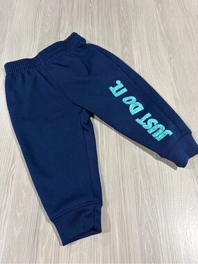 7/$20 Nike Baby Navy Sweatpants with Teal 'JUST DO IT' Graphic